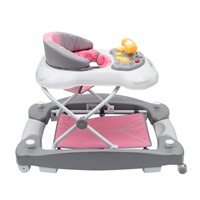 Detské chodítko s hojdačkou a sikónovými kolieskami Baby Mix ružové
